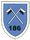 Ein blaues Wappen zeigt zwei gekreuzte Fahnen und die Nummer 186 darunter.