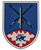Ein Wappen zeigt gekreuzte Raketen und einen blauen Löwen auf rotem Hintergrund, inspiriert von FlaRgt 600.