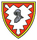 Ein Wappen mit einem Ritterhelm in der Mitte, umgeben von einem roten und gelben Rand, symbolisiert eine Stabskompanie.