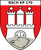 Ein rotes Wappen zeigt eine weiße Burg mit drei Türmen und einen grauen Eberkopf darunter, beschriftet mit "NSCHKP 170". Wappen der Nachschubkompanie 170 aus Hamburg