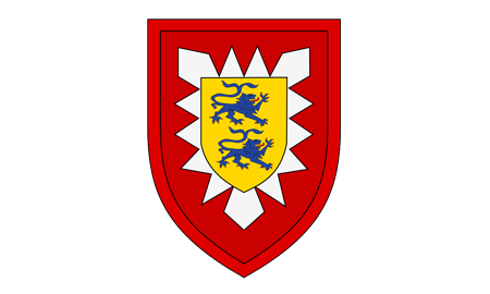 Ein Wappen mit zwei blauen Löwen auf gelbem Grund, umgeben von roten und weißen Zacken.