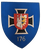 Ein blaues Wappen mit einem weißen Kreuz zeigt ein rotes Schild mit Burg und Löwe, darunter die Zahl 176.