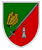 Ein Wappen zeigt ein Schwert, ein Eichenblatt und ein Turm-Symbol auf geteiltem grün-rotem Hintergrund.