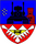 Ein Wappen zeigt einen Panzer, einen Turm und fliegende Vögel vor einem blauen Hintergrund über einem rot-weißen Muster. Wappen FlaLRgt 6