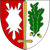 Ein Wappen zeigt ein gelbes Schwert, ein grünes Eichenblatt und ein weißes Symbol auf rotem und weißem Hintergrund.