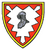 Ein Wappen mit einem Ritterhelm in der Mitte, umgeben von einem roten und gelben Rand, symbolisiert eine Stabskompanie.