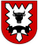 Ein rotes Wappen zeigt einen schwarzen Stierkopf und ein stilisiertes Zahnrad, symbolisch für die Pionierkompanie.