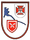 Ein Wappen zeigt stilisierte Symbole und Umrisse, die möglicherweise das Ersatzbataillon 605 repräsentieren.