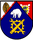 Ein Wappen zeigt einen weißen Bären, ein Zahnrad mit Schraubenschlüssel und ein Blatt auf blauem und rotem Hintergrund.