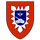 Ein rotes Wappen mit einem blauen Schild zeigt einen Panzer und ein Flügelrad, umgeben von einem weißen Sternmuster.